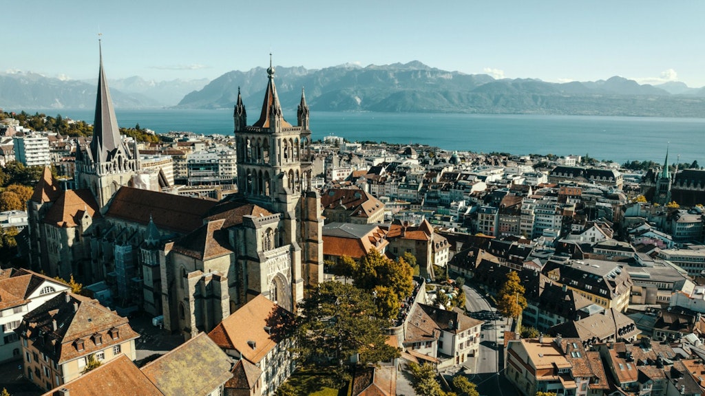 View over the old town of Lausanne with the lake in the background.