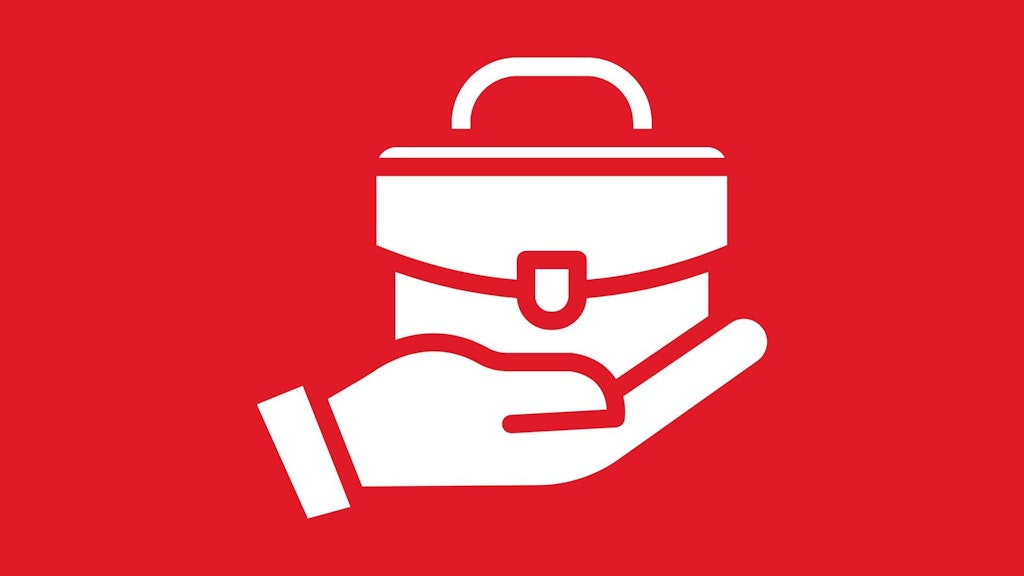 A hand holding a briefcase.