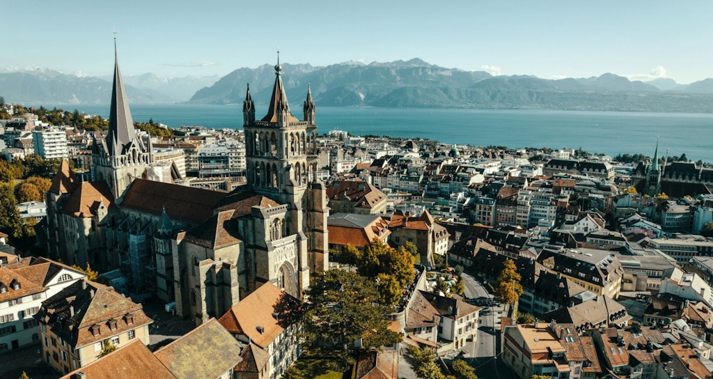 View over the old town of Lausanne with the lake in the background.